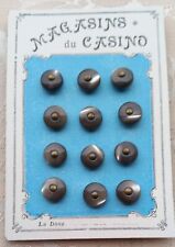 12 GREY MOTHER OF PEARL BUTTONS ON ANTIQUE HABERDASHERY CARD DIAMETER 0.9 CM