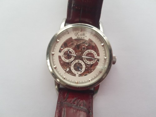 Montre remontage - tb,