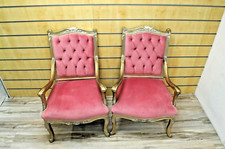Deux fauteuils Louis XV en bois hêtre et en daim neuf de couleur rose et doré.