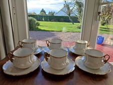 6 TASSES ET SOUCOUPES PORCELAINE DE LIMOGES