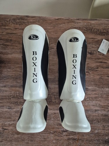 Protege tibia boxe