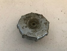 UN BOUCHON DE RADIATEUR MOTO