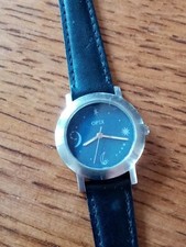 Montre femme Opex quartz. Pile neuve et bracelet neufs.