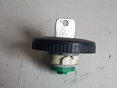Bouchon réservoir avec une