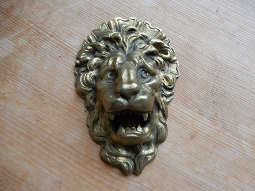 Tête lion bronze - de,