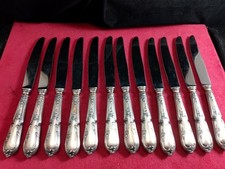 Service de 12 couteaux en