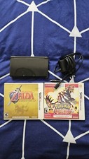 3DS + 2 jeux + Chargeur Peut être vendu séparement.