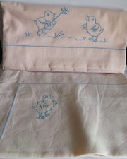 Parure brodée de lit bébé