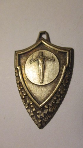 Médaille métallique ancienne