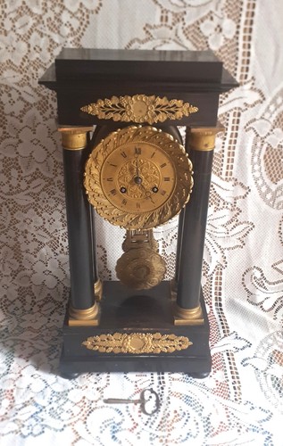 Horloger pendule à - ,