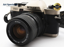 [Exc+8] Appareil Photo Reflex argentique Nikon FE10 + Ai-s Zoom-Nikkor 35-70m...