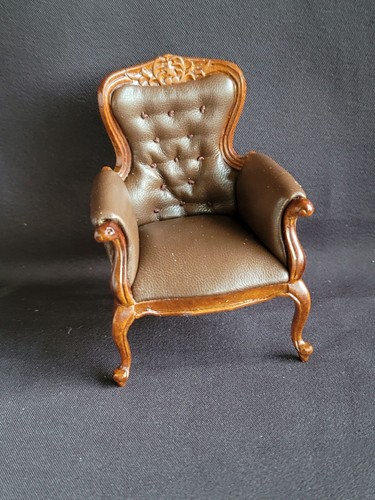 Fauteuil miniature capitonné