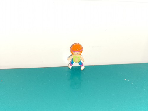 Polly pocket figurine doll