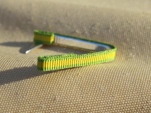 Fixe ruban rappel - , boutonnière