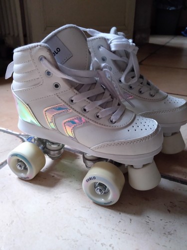 Tbe paire patins à - tbe, de