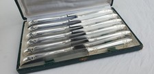 12 Couteaux de table plaqué argent époque Art-déco modèle damier
