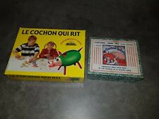 the laughing pig (set of 2 antique toys)