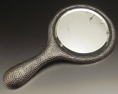 Grand miroir face main - face,