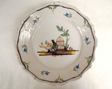 Nevers earthenware plate basket cage bird flowers 18th century