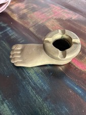 Cendrier ancien en forme de pied ( laiton) 420 grs.