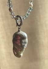 Un pendentif Perle Baroque bas