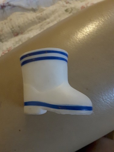 Une botte chaussure - de, poupée