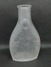 Ancien biberon de bébé à soupape en verre moulé ou soufflé modèle sans marque