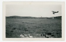 PHOTO snapshot, un avion aviation atterrissage aéronautique terrain hangar