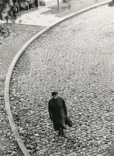 photo woman walking in the street line silver architecture vintage pavers