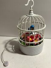 Plastic Animated Singing Bird W/Lighted Color Change Flower Bed in Plastic Cage