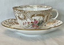 A THE QUADRILOBÉ PORCELAIN SARREGUEMINES MINTON 821 CUP AND SAUCER