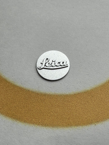 Badge point logo leica - de,