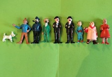 9 figurines TINTIN et Le lac