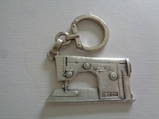 ANCIEN PORTE CLE METAL MACHINE