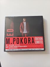 CD DVD M Pokora R E D