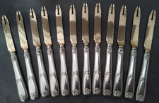 RARE 12 COUTEAUX A MELON