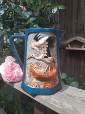 carafe  en faïence polychrome ancienne St Clément Cigognes Pichet Barbotine