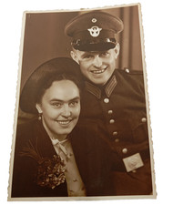 R7/05/25 (REF28378): Photo postcard couple including soldier war 39/45