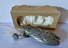 heurtoir de porte  forme cigale avec fixation