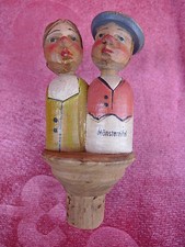 Beautiful old decorative carved wooden cap, couple kissing