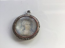 Médaillon broche en argent massif cerclage or entourée de perles fines début 19 