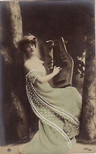 Old postcard - young woman playing zither. Photo Reutlinger, Paris.