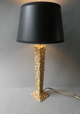 lampe en fonte dorée style