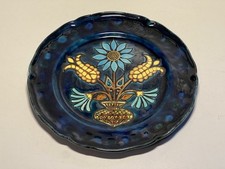 assiette décorative Signé