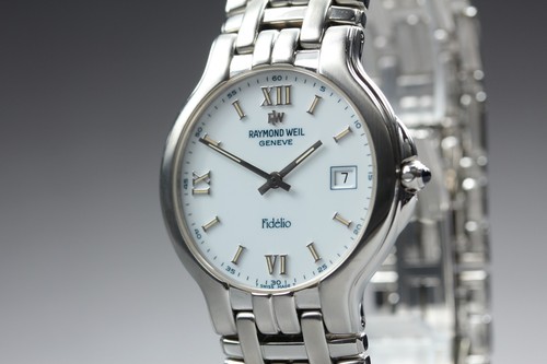 Presque comme neuve montre - [presque,