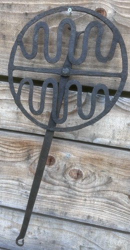 Rotating grill folk art