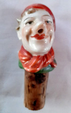 bec verseur tête grotesque