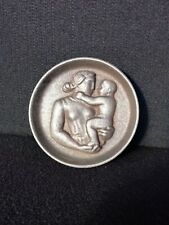 Médaillon en fonte, provenant