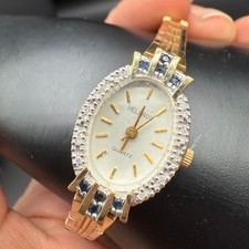 Helbros Ladies Cocktail Watch Gold Tone Bezel Quartz Diamond Sapphire Stones