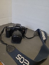 Canon EOS Rebel SLR Camera With Canon 35-80 1:4 -5.6 EF Zoom Lens works